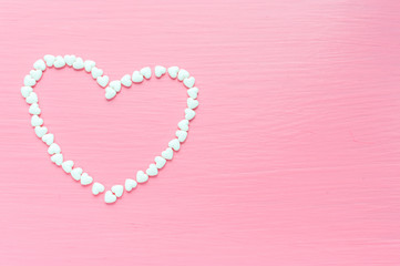white heart on a pink background. concept St. Valentine's Day