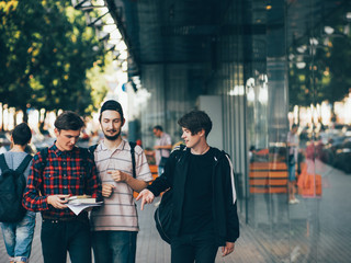 urban teenage hipster lifestyle. young boys choose future career preparing to enter university or...
