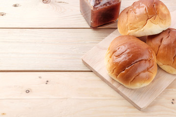 Butter roll on wooden background