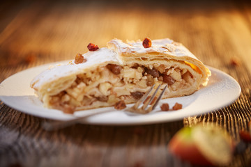 Apfelstrudel with raisins on a plate