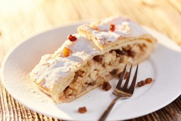 Apfelstrudel with raisins on a plate