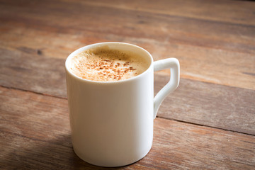 coffee mug on wood table
