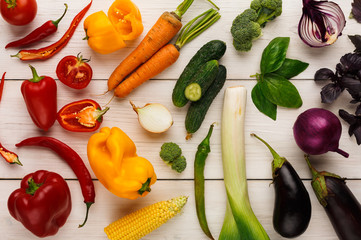 Rainbow background with lots of colorful vegetables