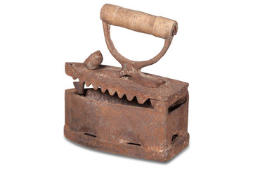 Antique metal iron on a white background