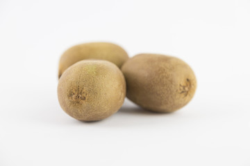 three kiwy on a white background