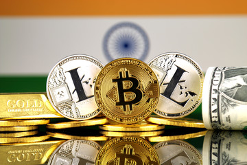 Physical version of Bitcoin, Litecoin, gold, US Dollar and India Flag. Conceptual image for investors in cryptocurrency, gold and dollars.