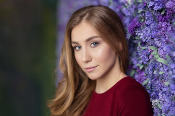 Close-up portrait of young beautiful girl. Fashion photo. Studio photo. Hairstyle - styling, Makeup. Fashionable hairstyle, beauty, self-care, boutique, magazine. Beautiful fair hair. Amazing girl.