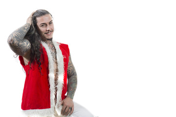 Young Santa Claus with tattoos on white background, christmas card