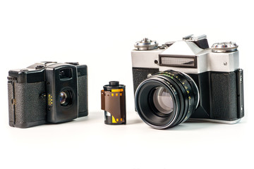 Retro film photo camera isolated on white background. Old analog