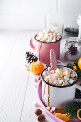 two cups with hot chocolate or cocoa with melted marshmallow
