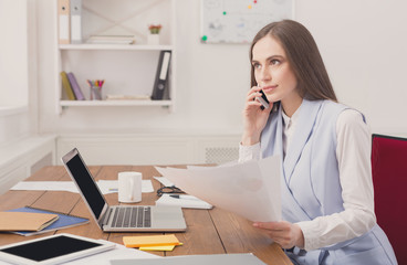 Business talk, woman consulting by phone at office