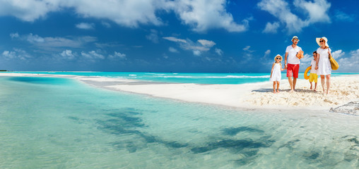Family on a tropical beach vacation