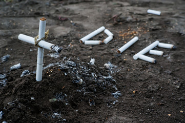 the word die written cigarettes