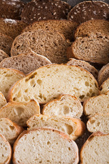 Bakery concept. Plenty of sliced bread background