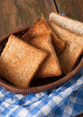 Breakfast background, toasts on checkered napkin closeup