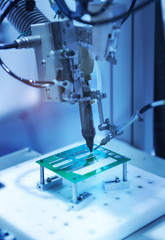 robotic system for automatic checking of printed circuit boards