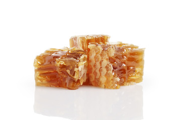 three pieces of honeycom isolated on white