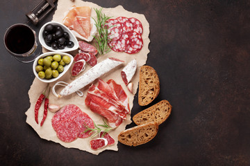 Salami, sausage, prosciutto and wine