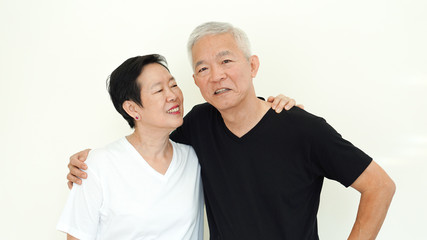 Fototapeta premium Asian senior couple smile, life with no worry on white background