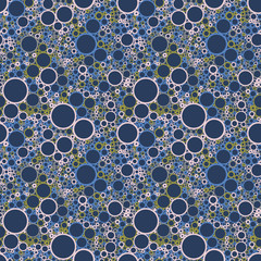 seamless vector pattern with colored rings on a dark blue background