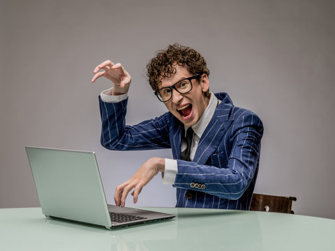 Funny man using laptop