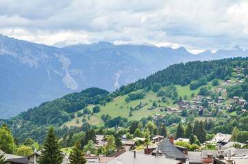 Fototapeta na wymiar Villages with mountain background in Switzerland.