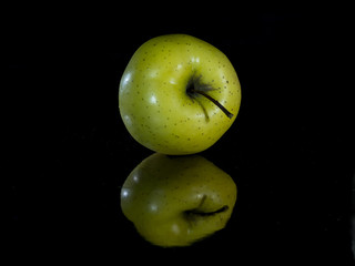 Apple on black background.