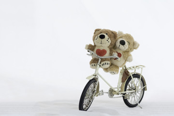 Love bear on a bicycle