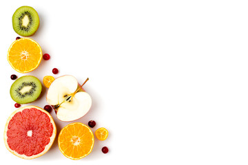 Halves of ripe fruit, kiwi, Apple, orange and grapefruit on white .