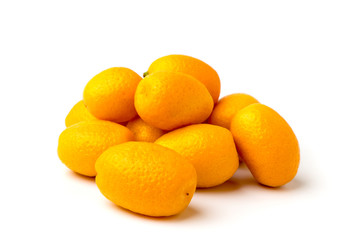 A bunch of ripe kumquat on white