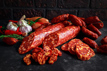 Fototapeta premium Variety of dry cured Spanish pork chorizo sausages made with paprika and garlic