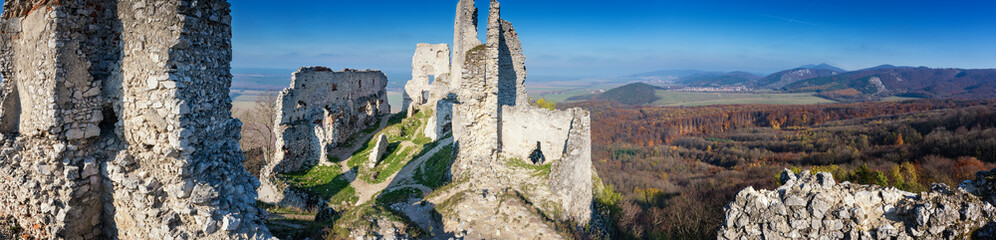 Fototapeta na wymiar Abandoned ruins of medieval Plavecky castle in autumn