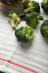 Natural broccoli on white kitchen towel