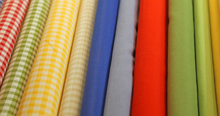 kinds of cloth for sale in a haberdashery shop