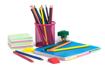 Fototapeta premium colored pencils in the basket, Eraser and pencil sharpener on white background