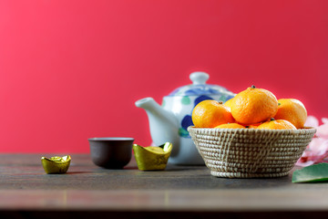 shot of accessories Chinese new year & decoration Lunar festival concept background.beautiful arrangement essential items on modern rustic wood red wallpaper.Sign objects for the decor season.