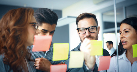 Creative business people working on business project in office