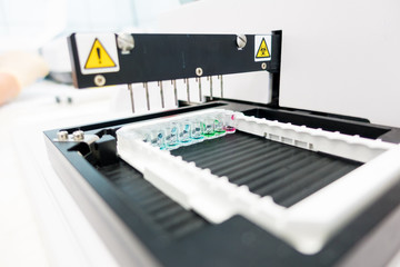 PCR robot for genetic analysis of biological samples in a medical laboratory