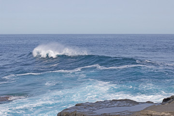 A wave with white foam.
