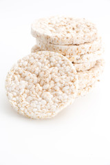 Round rice cakes/ crackers, on white background.