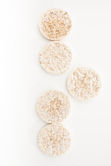 Round rice cakes/ crackers, on white background.