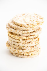 Round corn cakes/ crackers, on white background.