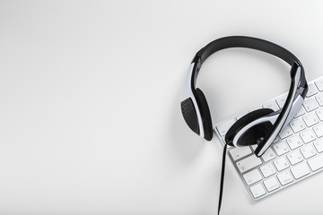 headset on keyboard computer laptop