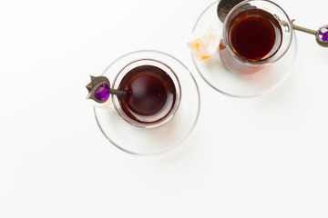 Turkish tea in traditional glass isolated on white background