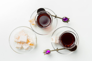 Turkish tea in traditional glass isolated on white background