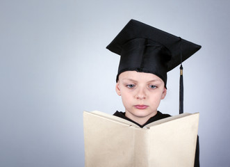 Boy with a student hat. Knowledge, education and a successful career background.