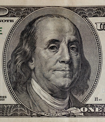 Portrait of benjamin franklin on the hundred dollar bill closeup