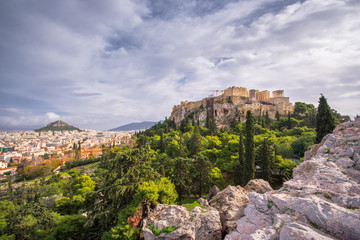 Acropolis with Parthenon with the hill of Lycabetus and nice clouds, Greece.