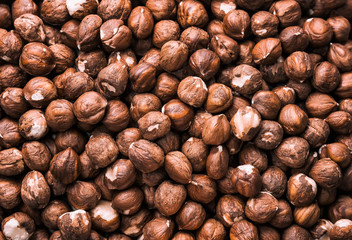 Fresh hazelnuts close-up top view. Background, texture.
