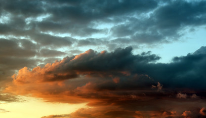 Fototapeta na wymiar Background of the blue-orange sky at sunset
